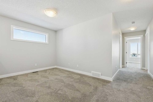 12 Willow Park Point, Cochrane, AB - Indoor Photo Showing Other Room