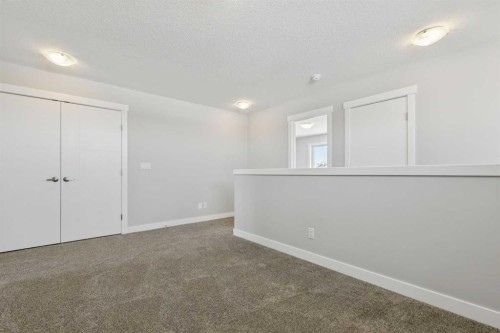 12 Willow Park Point, Cochrane, AB - Indoor Photo Showing Other Room