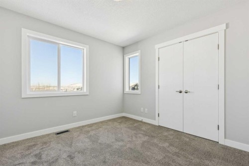 12 Willow Park Point, Cochrane, AB - Indoor Photo Showing Other Room