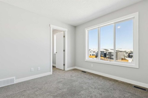 12 Willow Park Point, Cochrane, AB - Indoor Photo Showing Other Room