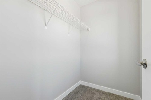 12 Willow Park Point, Cochrane, AB - Indoor With Storage