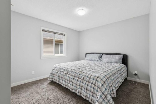 325 Evanspark Gardens Nw, Calgary, AB - Indoor Photo Showing Bedroom