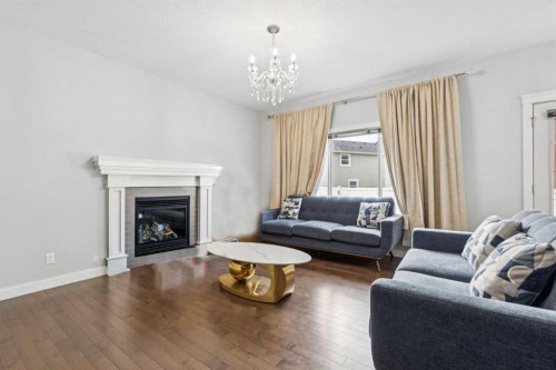 325 Evanspark Gardens Nw, Calgary, AB - Indoor Photo Showing Living Room With Fireplace