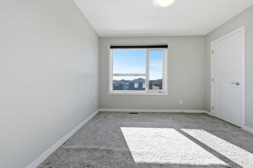 125-301 Redstone Boulevard Ne, Calgary, AB - Indoor Photo Showing Other Room