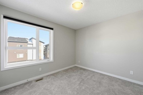125-301 Redstone Boulevard Ne, Calgary, AB - Indoor Photo Showing Other Room