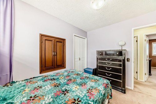 557 Rundleville Place Ne, Calgary, AB - Indoor Photo Showing Bedroom
