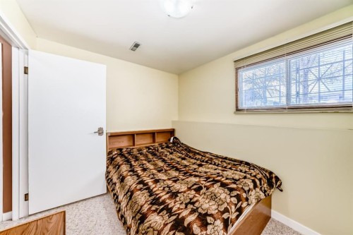 557 Rundleville Place Ne, Calgary, AB - Indoor Photo Showing Bedroom