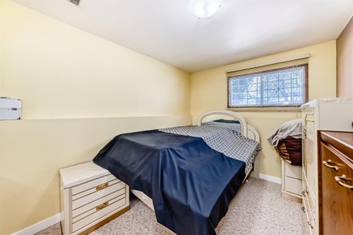 557 Rundleville Place Ne, Calgary, AB - Indoor Photo Showing Bedroom