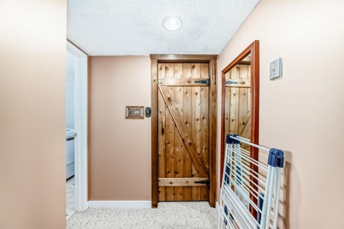 557 Rundleville Place Ne, Calgary, AB - Indoor Photo Showing Other Room