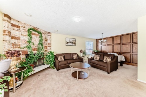 557 Rundleville Place Ne, Calgary, AB - Indoor Photo Showing Living Room
