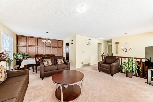 557 Rundleville Place Ne, Calgary, AB - Indoor Photo Showing Living Room