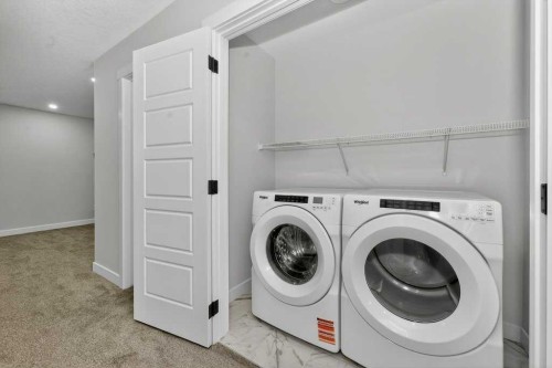 268 Cornerbrook Road Ne, Calgary, AB - Indoor Photo Showing Laundry Room