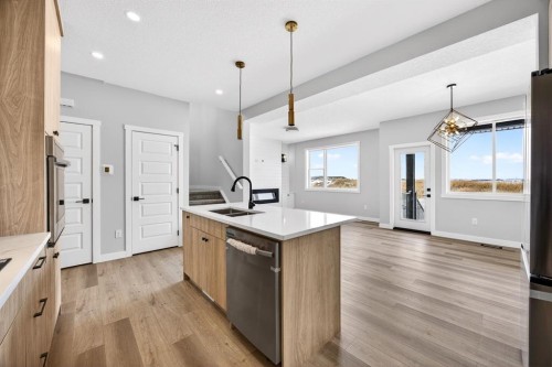 3426 Victory Way, Olds, AB - Indoor Photo Showing Kitchen With Double Sink With Upgraded Kitchen