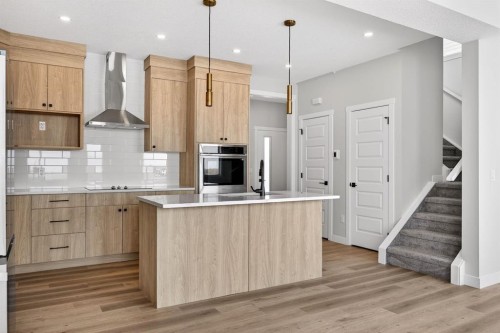 3426 Victory Way, Olds, AB - Indoor Photo Showing Kitchen With Upgraded Kitchen