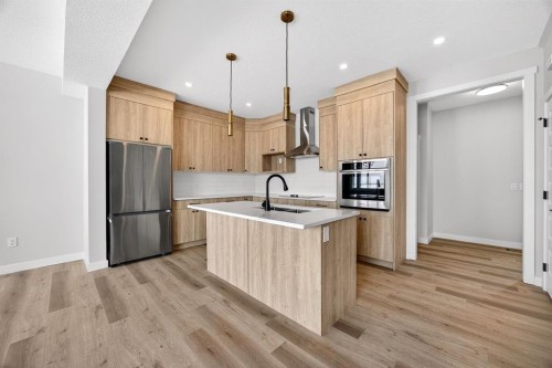 3426 Victory Way, Olds, AB - Indoor Photo Showing Kitchen With Upgraded Kitchen