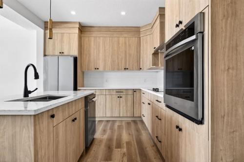 3426 Victory Way, Olds, AB - Indoor Photo Showing Kitchen With Upgraded Kitchen
