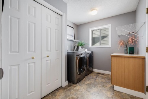 120 Hidden Ranch Crescent Nw, Calgary, AB - Indoor Photo Showing Laundry Room