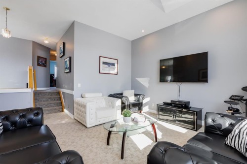 120 Hidden Ranch Crescent Nw, Calgary, AB - Indoor Photo Showing Living Room