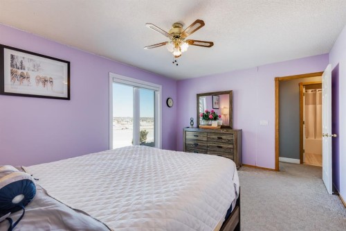 120 Hidden Ranch Crescent Nw, Calgary, AB - Indoor Photo Showing Bedroom