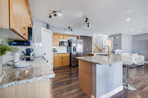 120 Hidden Ranch Crescent Nw, Calgary, AB - Indoor Photo Showing Kitchen With Upgraded Kitchen