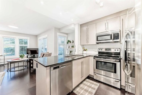 2103-11 Mahogany Row Se, Calgary, AB - Indoor Photo Showing Kitchen With Stainless Steel Kitchen