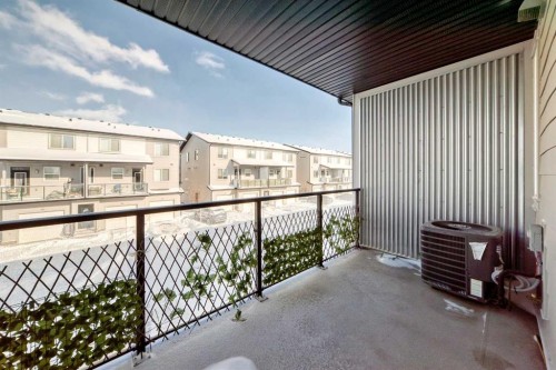 204-135 Redstone Walk Ne, Calgary, AB - Outdoor With Deck Patio Veranda With Exterior