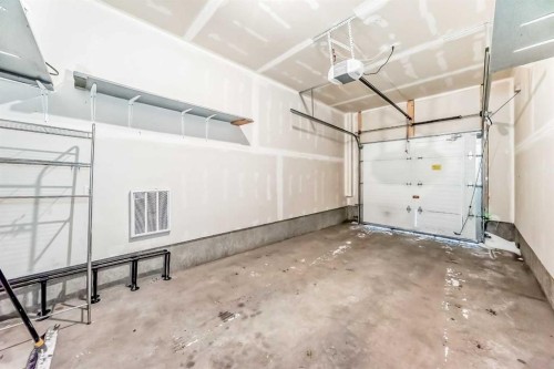 204-135 Redstone Walk Ne, Calgary, AB - Indoor Photo Showing Garage