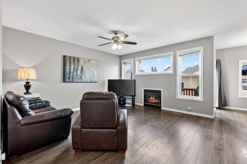 1153 Prestwick Circle Se, Calgary, AB - Indoor Photo Showing Living Room With Fireplace