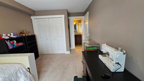 128-500 Rocky Vista Gardens Nw, Calgary, AB - Indoor Photo Showing Bedroom