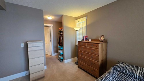 128-500 Rocky Vista Gardens Nw, Calgary, AB - Indoor Photo Showing Bedroom