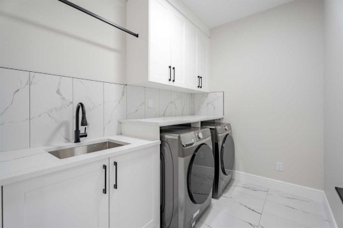 312 Watercrest Place, Chestermere, AB - Indoor Photo Showing Laundry Room