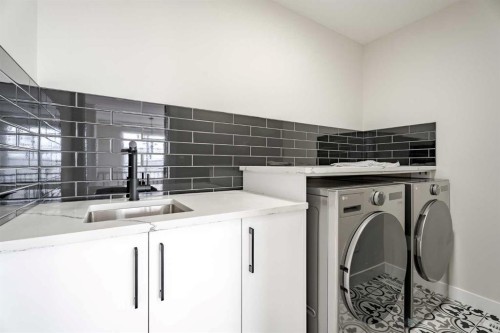 2045 Waterbury Road, Chestermere, AB - Indoor Photo Showing Laundry Room