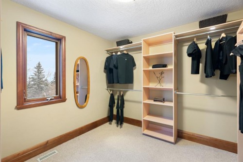 48 Coulee Park Sw, Calgary, AB - Indoor With Storage