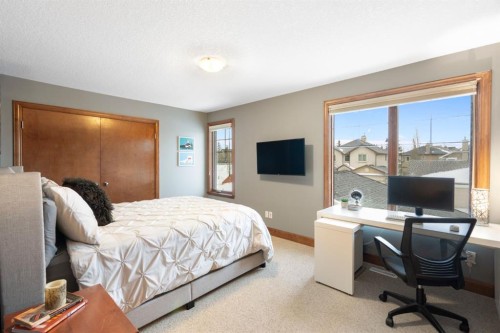 48 Coulee Park Sw, Calgary, AB - Indoor Photo Showing Bedroom