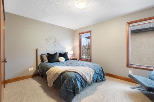 48 Coulee Park Sw, Calgary, AB - Indoor Photo Showing Bedroom