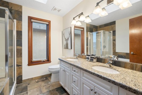 48 Coulee Park Sw, Calgary, AB - Indoor Photo Showing Bathroom