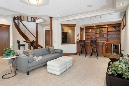 48 Coulee Park Sw, Calgary, AB - Indoor Photo Showing Living Room