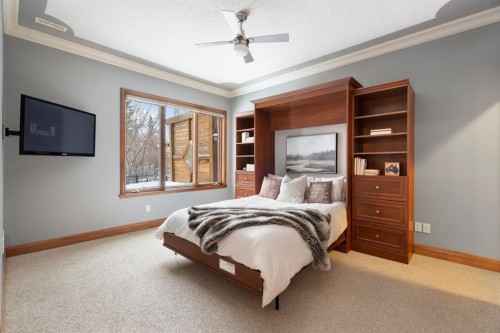 48 Coulee Park Sw, Calgary, AB - Indoor Photo Showing Bedroom