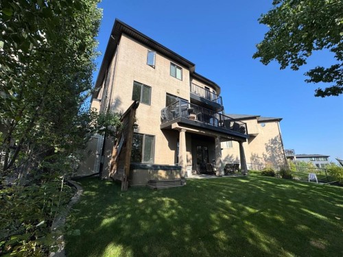 48 Coulee Park Sw, Calgary, AB - Outdoor