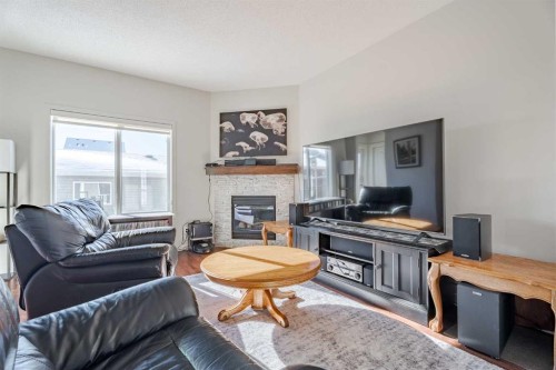 29 Evansridge Circle Nw, Calgary, AB - Indoor Photo Showing Living Room With Fireplace