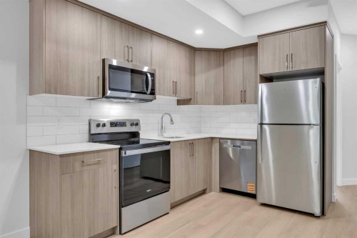 131 Ricardo Ranch Avenue Se, Calgary, AB - Indoor Photo Showing Kitchen With Stainless Steel Kitchen With Upgraded Kitchen