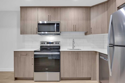 131 Ricardo Ranch Avenue Se, Calgary, AB - Indoor Photo Showing Kitchen With Stainless Steel Kitchen With Upgraded Kitchen