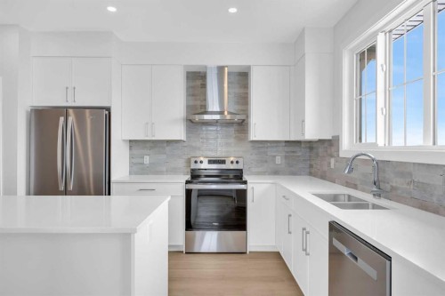 131 Ricardo Ranch Avenue Se, Calgary, AB - Indoor Photo Showing Kitchen With Stainless Steel Kitchen With Double Sink With Upgraded Kitchen