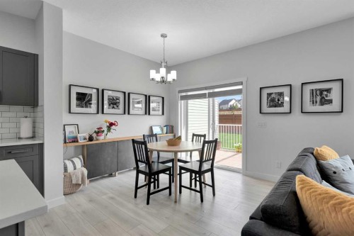 59 Belgian, Cochrane, AB - Indoor Photo Showing Dining Room