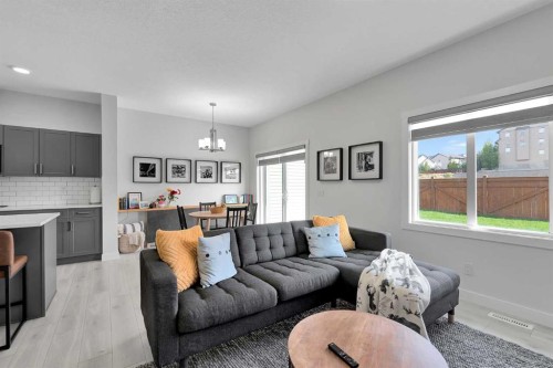 59 Belgian, Cochrane, AB - Indoor Photo Showing Living Room