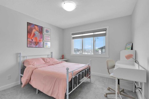 59 Belgian, Cochrane, AB - Indoor Photo Showing Bedroom