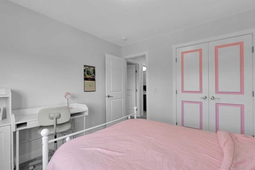 59 Belgian, Cochrane, AB - Indoor Photo Showing Bedroom