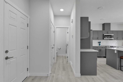 59 Belgian, Cochrane, AB - Indoor Photo Showing Kitchen