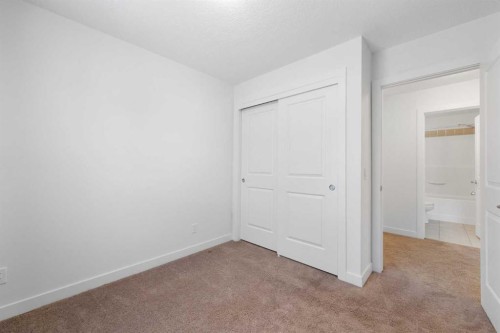 118 Evanscrest Manor Nw, Calgary, AB - Indoor Photo Showing Other Room