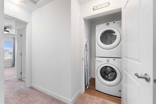 118 Evanscrest Manor Nw, Calgary, AB - Indoor Photo Showing Laundry Room
